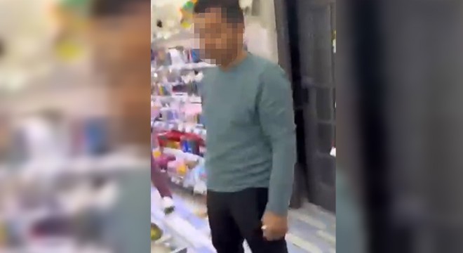 Genç kızın fotoğrafını çeken şüpheliye tepki